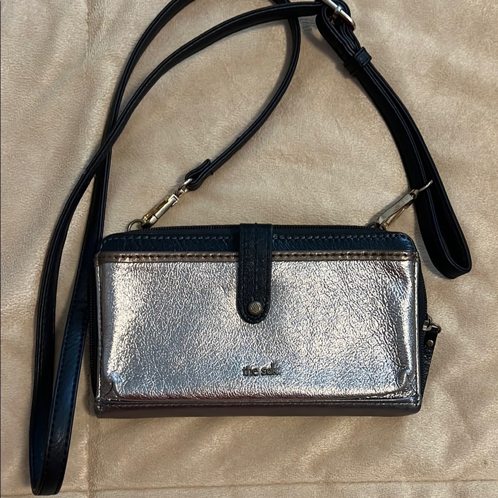 The Sak Black and Silver Wallet with Silver-Tone Hardware